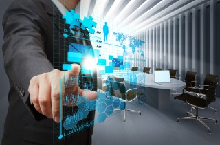 Businessmann pointing at screen, background picture.