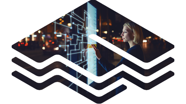 F-kirjainlogo, jonka sisällä nainen ja näyttöseinä